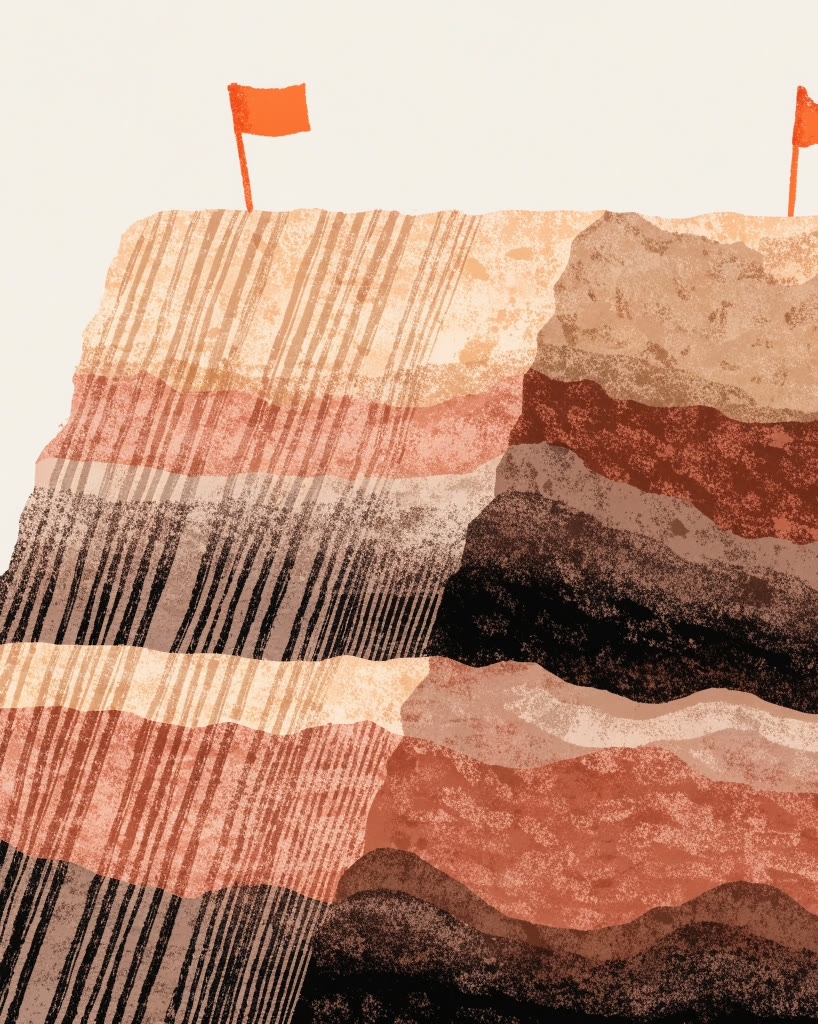 Pared de tierra compactada en capas con banderas de topografía