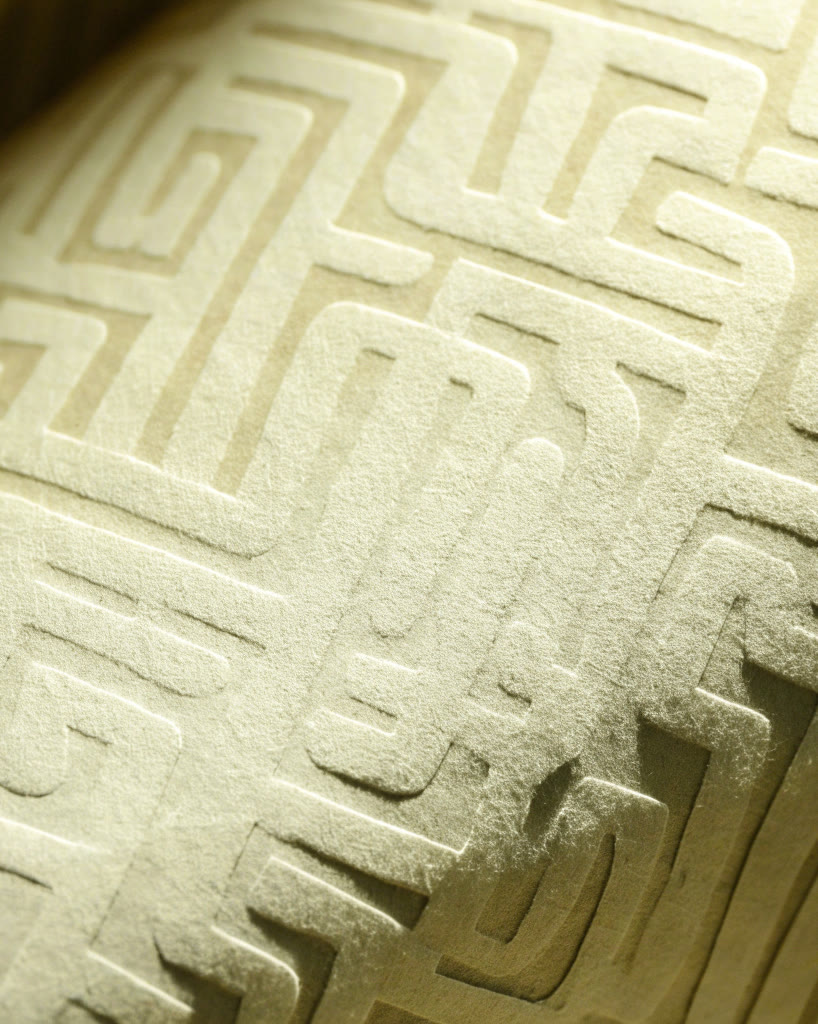 Papel con laberinto geométrico en bajorrelieve